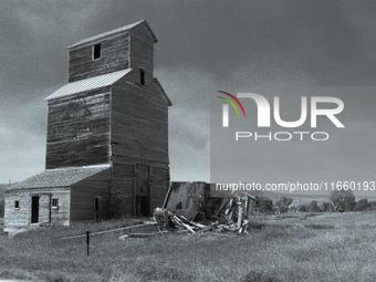 An abandoned grain elevator is in the ghost town of Owanka, South Dakota, USA. (