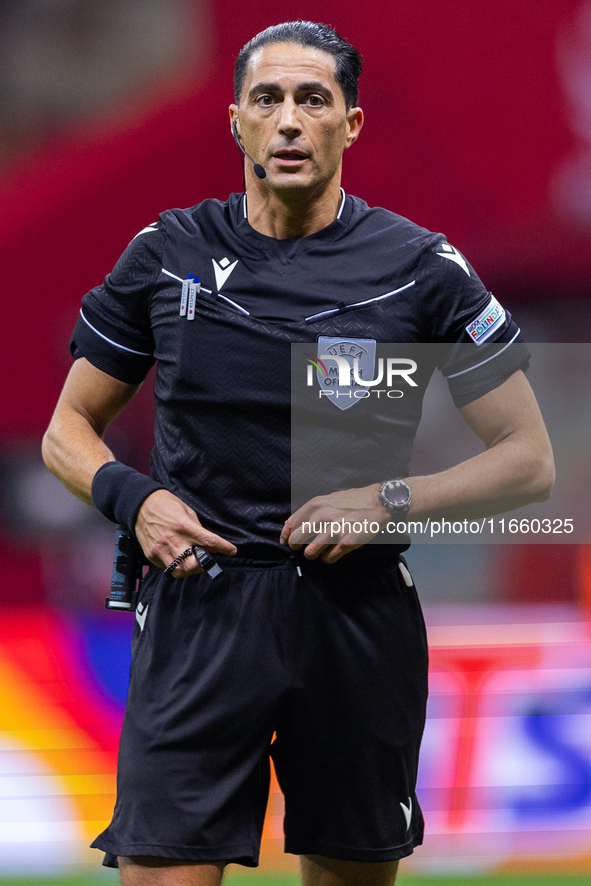 Referee Serdar Gozubuyuk during the  UEFA Nations League 2024 League A Group A1 match between Poland and Portugal , at the PGE Narodowy in W...