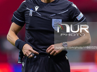 Referee Serdar Gozubuyuk during the  UEFA Nations League 2024 League A Group A1 match between Poland and Portugal , at the PGE Narodowy in W...