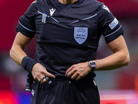 Referee Serdar Gozubuyuk during the  UEFA Nations League 2024 League A Group A1 match between Poland and Portugal , at the PGE Narodowy in W...