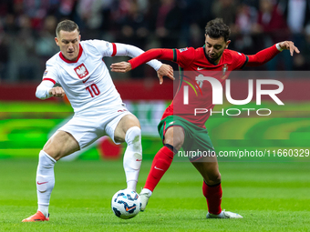 Sebastian szymanski, Bruno Fernandes are playing during the  UEFA Nations League 2024 League A Group A1 match between Poland and Portugal ,...