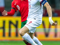 Bruno Fernandes and Robert Lewandowski are  playing during the  UEFA Nations League 2024 League A Group A1 match between Poland and Portugal...