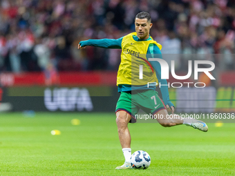 Cristiano Ronaldo warms up before  the  UEFA Nations League 2024 League A Group A1 match between Poland and Portugal , at the PGE Narodowy i...