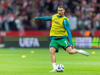 Cristiano Ronaldo warms up before  the  UEFA Nations League 2024 League A Group A1 match between Poland and Portugal , at the PGE Narodowy i...