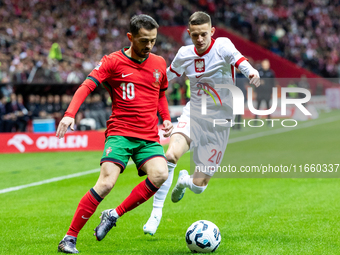 Bernardo Silva and Sebastian Szymanski are playing during the  UEFA Nations League 2024 League A Group A1 match between Poland and Portugal...