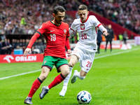 Bernardo Silva and Sebastian Szymanski are playing during the  UEFA Nations League 2024 League A Group A1 match between Poland and Portugal...