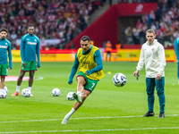 Cristiano Ronaldo warms up before  the  UEFA Nations League 2024 League A Group A1 match between Poland and Portugal , at the PGE Narodowy i...