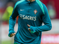 Cristiano Ronaldo warms up before  the  UEFA Nations League 2024 League A Group A1 match between Poland and Portugal , at the PGE Narodowy i...