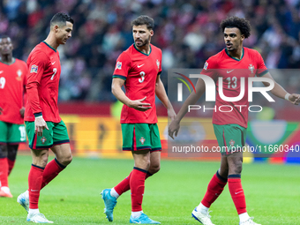 Cristiano Ronaldo, Ruben Dias, Renato Veiga are playing during   the  UEFA Nations League 2024 League A Group A1 match between Poland and Po...