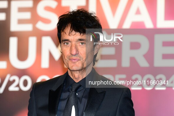 Portrait of actor Gulio Base and an actress at the opening night of the Lumiere festival in Lyon, France, on October 12, 2024. 