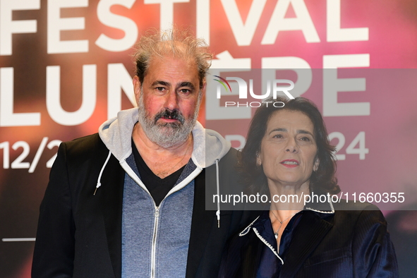 Portrait of actor Gustave Kervern and a woman at the opening night of the Lumiere festival in Lyon, France, on October 12, 2024. 