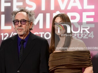 Monica Bellucci and Tim Burton attend the opening night of the Lumiere festival in Lyon, France, on October 12, 2024. (