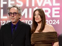 Monica Bellucci and Tim Burton attend the opening night of the Lumiere festival in Lyon, France, on October 12, 2024. (