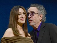 Monica Bellucci and Tim Burton attend the opening night of the Lumiere festival in Lyon, France, on October 12, 2024. (