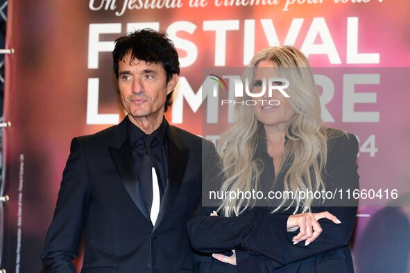 Portrait of actor Gulio Base and an actress at the opening night of the Lumiere festival in Lyon, France, on October 12, 2024. 