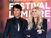 Portrait of actor Gulio Base and an actress at the opening night of the Lumiere festival in Lyon, France, on October 12, 2024. (