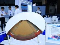 Visitors look at new materials and products at the 9th China Advanced Materials Industry Expo 2024 in Qingdao, China, on October 12, 2024. (