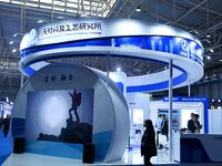 Visitors visit the booth of the Aerospace Materials and Technology Research Institute at the 9th China Advanced Materials Industry Expo 2024...