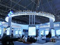 Visitors visit the booth of China North Industries Group Co LTD at the 9th China Advanced Materials Industry Expo 2024 in Qingdao, China, on...