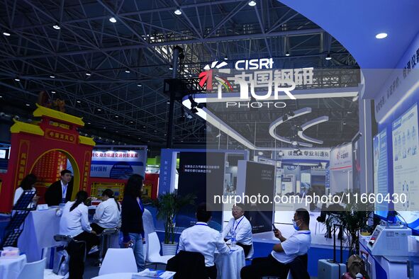 Visitors visit the booth of China Steel Research at the 9th China Advanced Materials Industry Expo 2024 in Qingdao, China, on October 12, 20...