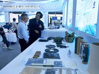 Visitors look at new materials and products at the 9th China Advanced Materials Industry Expo 2024 in Qingdao, China, on October 12, 2024. (