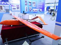 An exhibitor shows a target machine at the 9th China Advanced Materials Industry Expo 2024 in Qingdao, China, on October 12, 2024. (