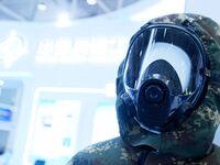 An exhibitor displays personal wear and protective equipment at the 9th China Advanced Materials Industry Expo 2024 in Qingdao, China, on Oc...