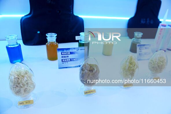 An exhibitor displays adhesive materials at the 9th China Advanced Materials Industry Expo 2024 in Qingdao, China, on October 12, 2024. 