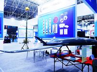 An exhibitor shows a drone at the 9th China Advanced Materials Industry Expo 2024 in Qingdao, China, on October 12, 2024. (