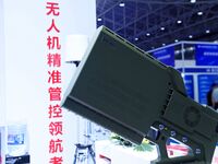 An exhibitor displays a drone control platform at the 9th China Advanced Materials Industry Expo 2024 in Qingdao, China, on October 12, 2024...