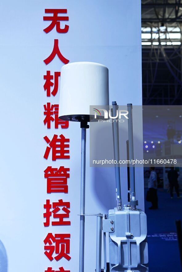 An exhibitor displays a drone control platform at the 9th China Advanced Materials Industry Expo 2024 in Qingdao, China, on October 12, 2024...