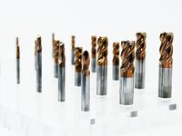 An exhibitor displays a new material composite drill bit at the 9th China Advanced Materials Industry Expo 2024 in Qingdao, China, on Octobe...