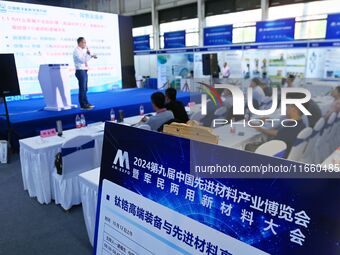 People attend a seminar on new materials at the 9th China Advanced Materials Industry Expo in Qingdao, China, on October 12, 2024. (