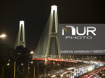 Weekend rush hour traffic occurs on the outer ring highway of Xupu Bridge in Shanghai, China, on October 12, 2024. (