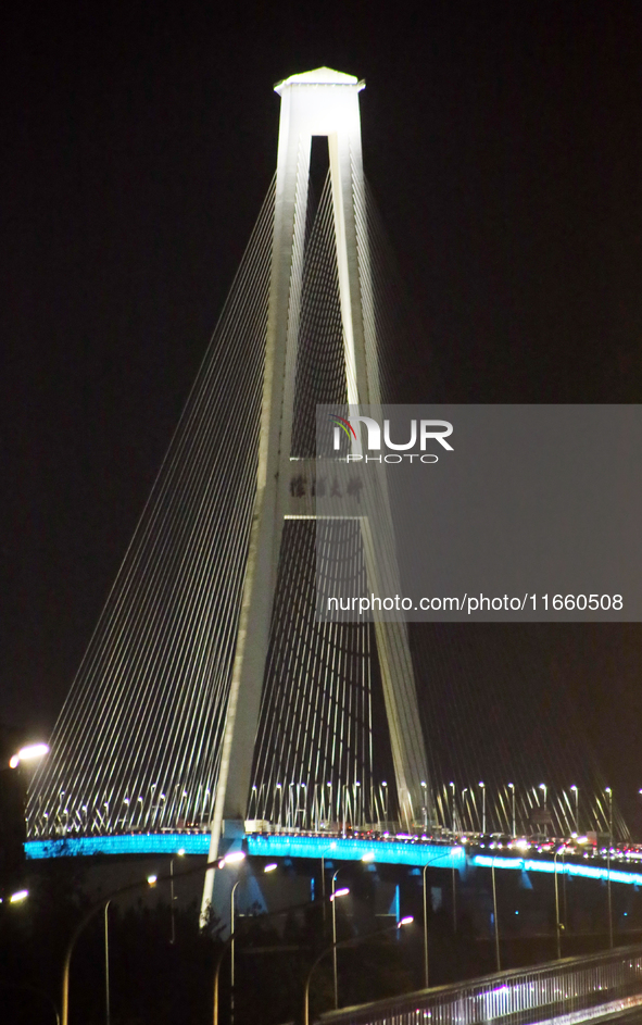 Weekend rush hour traffic occurs on the outer ring highway of Xupu Bridge in Shanghai, China, on October 12, 2024. 