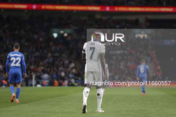 Bukayo Saka of England and Dimitris Giannoulis of Greece participate in the football game between England and Greece for the UEFA Nations Le...