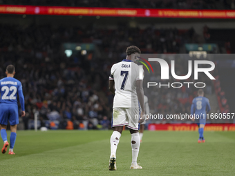 Bukayo Saka of England and Dimitris Giannoulis of Greece participate in the football game between England and Greece for the UEFA Nations Le...