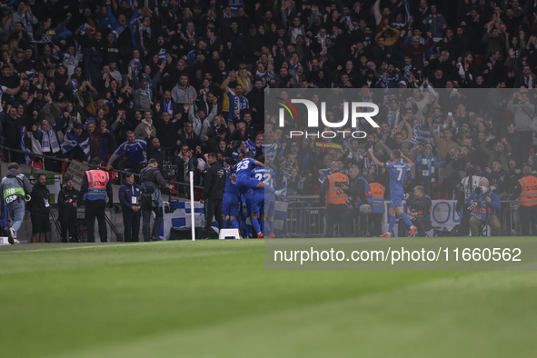 Konstantinos Koulierakis, Dimitris Giannoulis, Vangelis Pavlidis, Manolis Siopis, Giorgos Masouras, and Christos Tzolis of Greece celebrate...