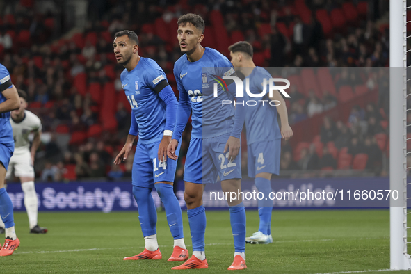 Vangelis Pavlidis and Dimitris Giannoulis of Greece participate in the football game between England and Greece for the UEFA Nations League...