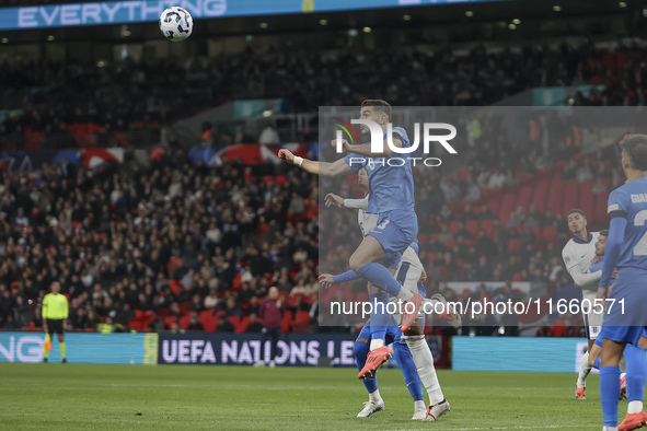 Konstantinos Koulierakis of Greece is in the air for a header during the football game between England and Greece for the UEFA Nations Leagu...