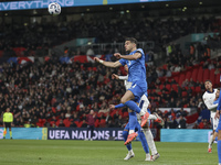 Konstantinos Koulierakis of Greece is in the air for a header during the football game between England and Greece for the UEFA Nations Leagu...