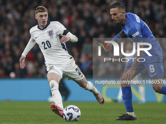 Cole Palmer of England and Dimitris Kourbelis of Greece play during the football game between England and Greece for the UEFA Nations League...