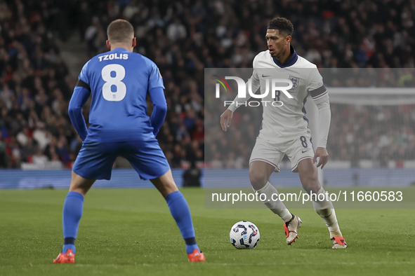 Jude Bellingham of England and Christos Tzolis of Greece are in action during the football game between England and Greece for the UEFA Nati...