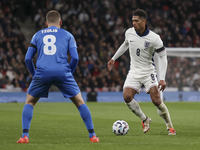 Jude Bellingham of England and Christos Tzolis of Greece are in action during the football game between England and Greece for the UEFA Nati...