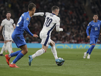 Phil Foden of England and Dimitris Giannoulis of Greece play during the football game between England and Greece for the UEFA Nations League...