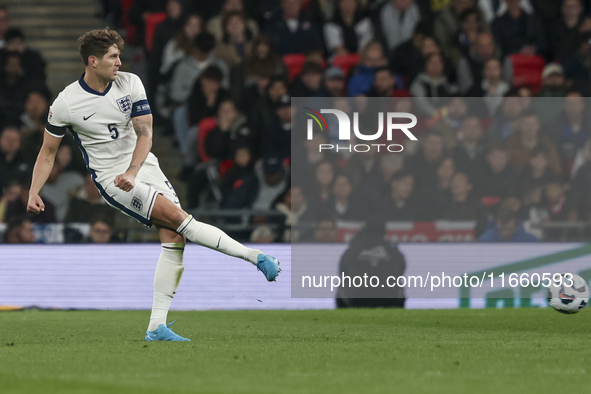 John Stones, captain of England, kicks the ball during the football game between England and Greece for the UEFA Nations League 2024/25 Leag...