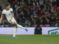 John Stones, captain of England, kicks the ball during the football game between England and Greece for the UEFA Nations League 2024/25 Leag...