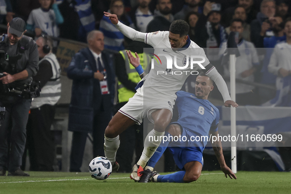 Jude Bellingham of England and Christos Tzolis of Greece are in action during the football game between England and Greece for the UEFA Nati...