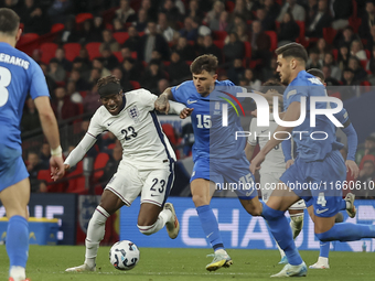 Noni Madueke of England, Lazaros Rota, and Ntinos Mavropanos of Greece participate in the football game between England and Greece for the U...