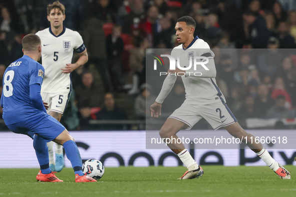 Trent Alexander-Arnold of England has the ball and Christos Tzolis of Greece is in action during the football game between England and Greec...